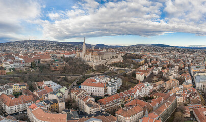 Aerial drone shot of Matthias Church on Buda hill during Budapest before sunrise in winter morning
