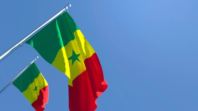 The national flag of Senegal flutters in the wind