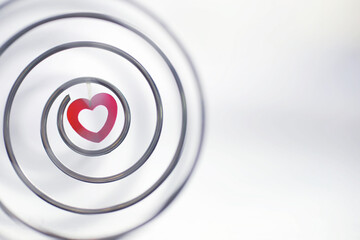 Metal spiral. The concept of endless turns. Golden ratio. The concept of memories and life path.