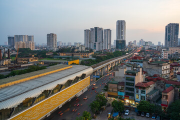 Fototapeta na wymiar Hanoi skyline cityscape during sunset period at Thanh Xuan street in 2020