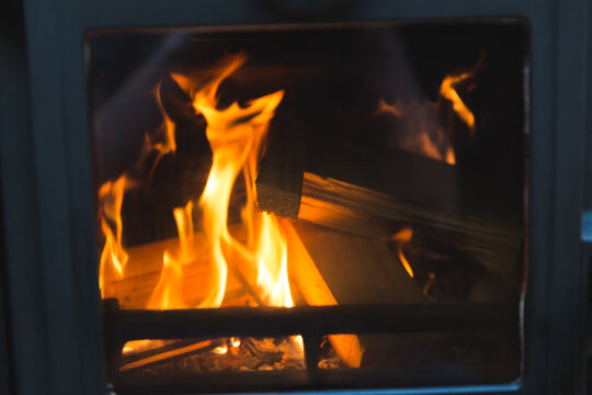 Logs Burning in Wood Stove, Fireplace, Home Heat