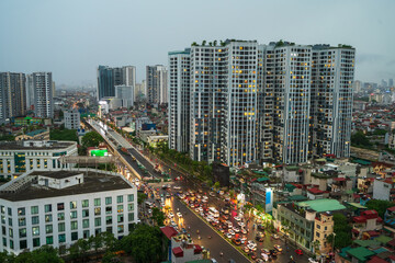 Fototapeta na wymiar Hanoi skyline cityscape during sunset period at Minh Khai street in 2020