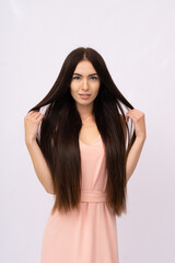 Young woman with long hair. Brunette