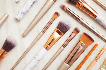 Set of makeup brushes on white background