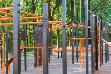 Fototapeta na wymiar Athletic equipment on outdoor workout area, closeup in selective focus