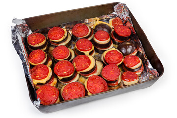 Eggplants chopped by circles and baked with tomatoes and cheese