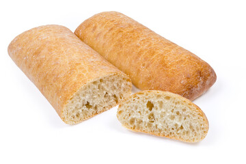Partly cut and whole ciabatta on a white background