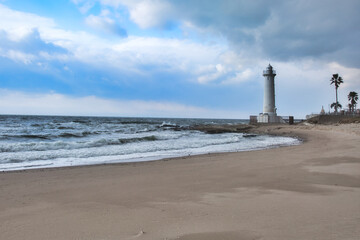 Fototapeta na wymiar 灯台と海の風景写真