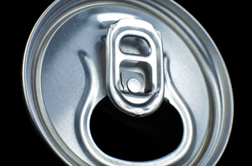 Can of fizzy drink on black background. Refreshing during summer heat. Vacations mood.