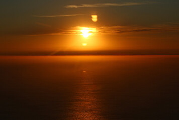 Fototapeta na wymiar Sunrise, the view from the aiplane