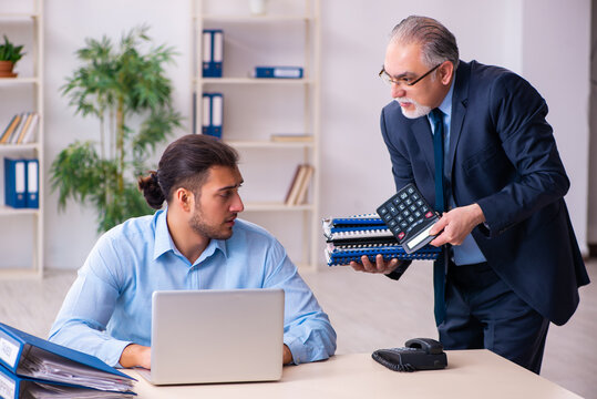 Old Boss And His Young Assistant In The Office