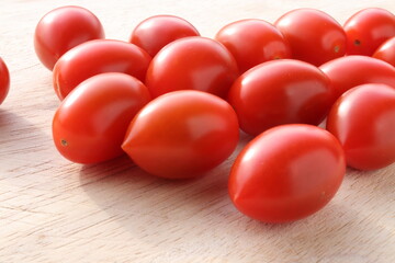 Cherry Tomatoes on a wooden chopping board