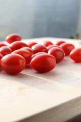 Cherry Tomatoes on a wooden chopping board