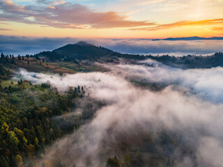 Morning fog over mountain valley.