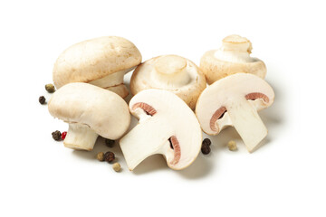 Fototapeta premium Raw mushrooms and peppercorns isolated on white background