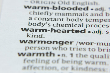 Obraz premium Word or phrase Warm-Hearted in a dictionary.