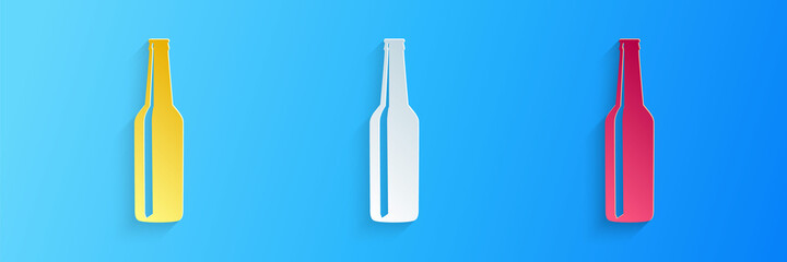 Paper cut Beer bottle icon isolated on blue background. Paper art style. Vector.