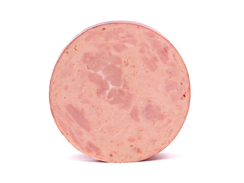 Slice of baloney salami isolated on white 