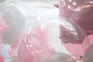 beautiful pink and transparent balloons. blur, selective focus