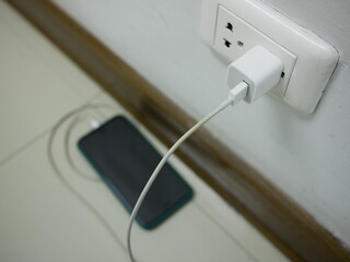 adapter or electric socket for phone charger.