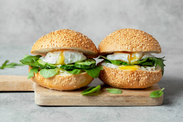two poached egg sandwiches