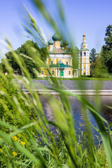 Yellow Transfiguration Cathedral with green domes in the Uglich Kremlin, the golden ring of Russia...