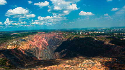 Obraz na płótnie Canvas Iron ore quarry open pit mining of iron ore is huge.