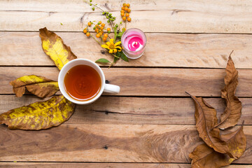 herbal healthy drinks hot lemon tea for health care cough sore with flowers ,yellow leaves...