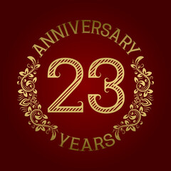 Golden emblem of twenty third anniversary. Celebration patterned sign on red.