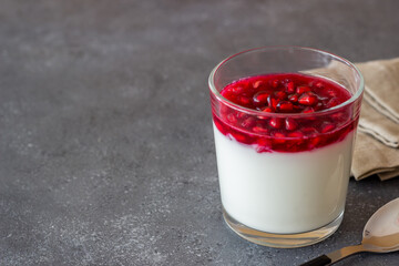 Italian dessert panna cotta with pomegranate. Vegetarian food. Healthy eating. Recipe.
