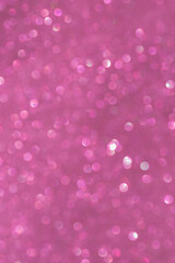 Abstract shiny pink blurred background Christmas .and New Year holidays. Vertical oriental.