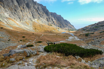 Pond in Valley of Five Spis Lakes surrounded by rocky summits, High Tatra Mountains. Slovakia