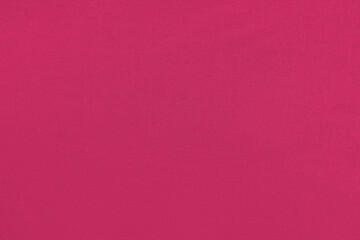 Red homogeneous background with a textured surface, fabric.