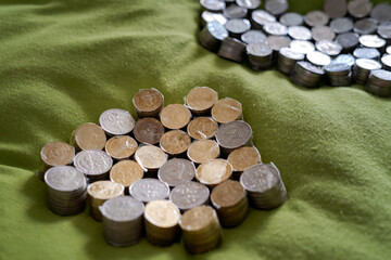 Coins of Malaysia. Financial Planning concept .The coins are arranged in value. Wrapped with clear tape for easy exchange at the shop. © ellinnur
