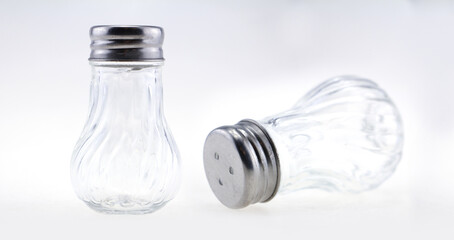 Bottle pepper. Empty glass jar on a white background.