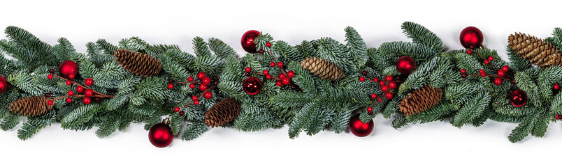 Christmas fir and decorations on white
