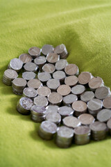 Coins of Malaysia. Financial Planning concept .The coins are arranged in value. Wrapped with clear tape for easy exchange at the shop. © ellinnur