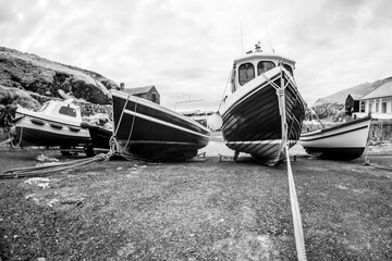Mullion harbour in infrared light black and white cornwall england uk 