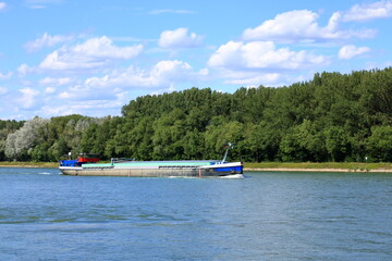 Fototapeta na wymiar Inland shipping transport on the rhine river near germersheim