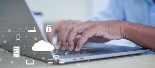 close up computer programmer man hand typing on keyboard for transfer or synch data upload and download from cloud computing with virtual interface in operation room, technology business concept
