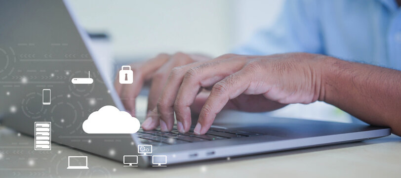 close up computer programmer man hand typing on keyboard for transfer or synch data upload and download from cloud computing with virtual interface in operation room, technology business concept