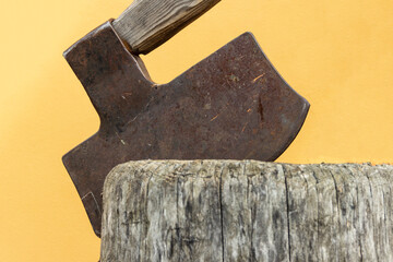 The executioner's ax stuck into a wooden block on the platform.