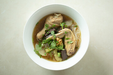 Soup small Rice Noodle with chicken. Thai rice noodles. Chicken noodle soup. A common street food in Thailand