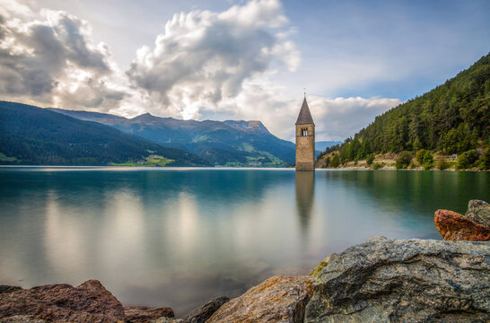 The bell tower of the sunken church in Curon, Resia Lake, Bolzano province, South Tyrol, Italy.