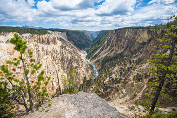 hiking the canyon rim south trail in grand canyon of the yellowstone, wyoming, usa