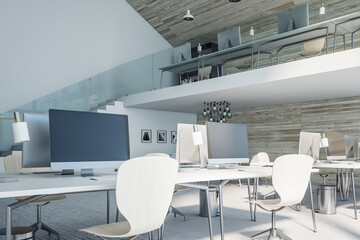 Modern loft office space with computers