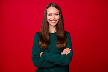 Fototapeta premium Photo of charming girl cross hands toothy smile in camera isolated over vivid red color background