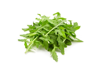 Fresh arugula or rucola leaves closeup isolated on white background