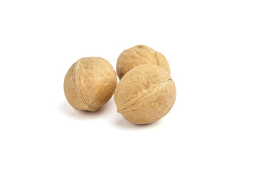 Whole walnuts isolated on white background