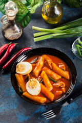 Spicy tteokbokki, korean rice cake with boiled egg